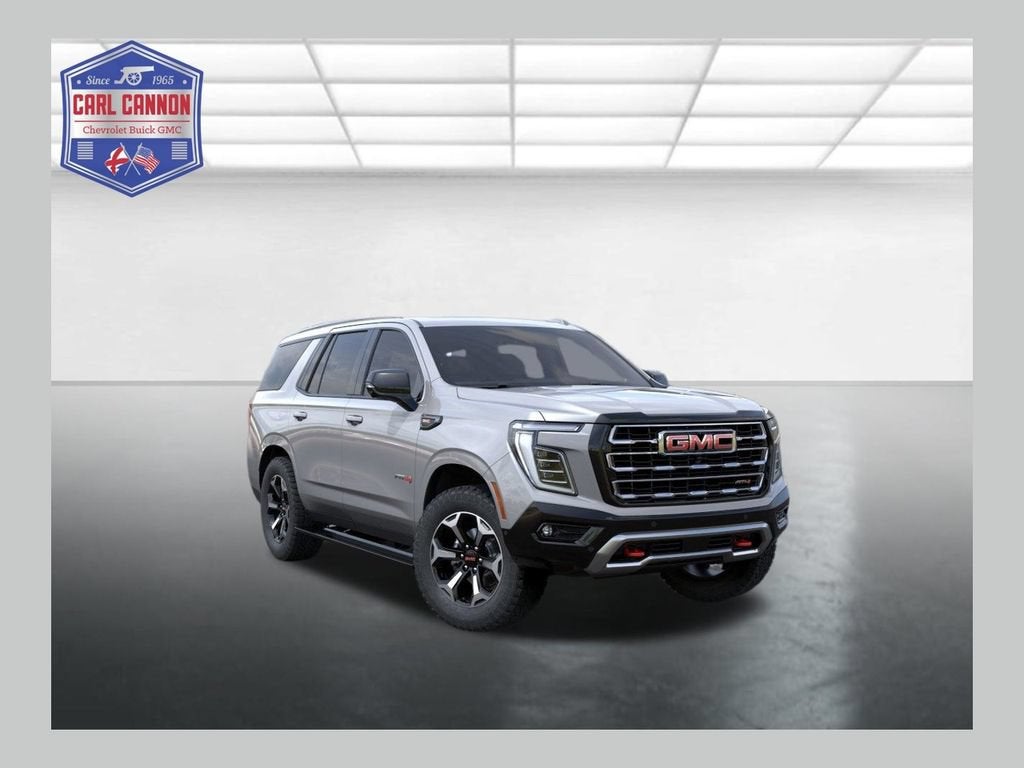 2026 GMC Yukon AT4 in Sterling Metallic — front three-quarter view