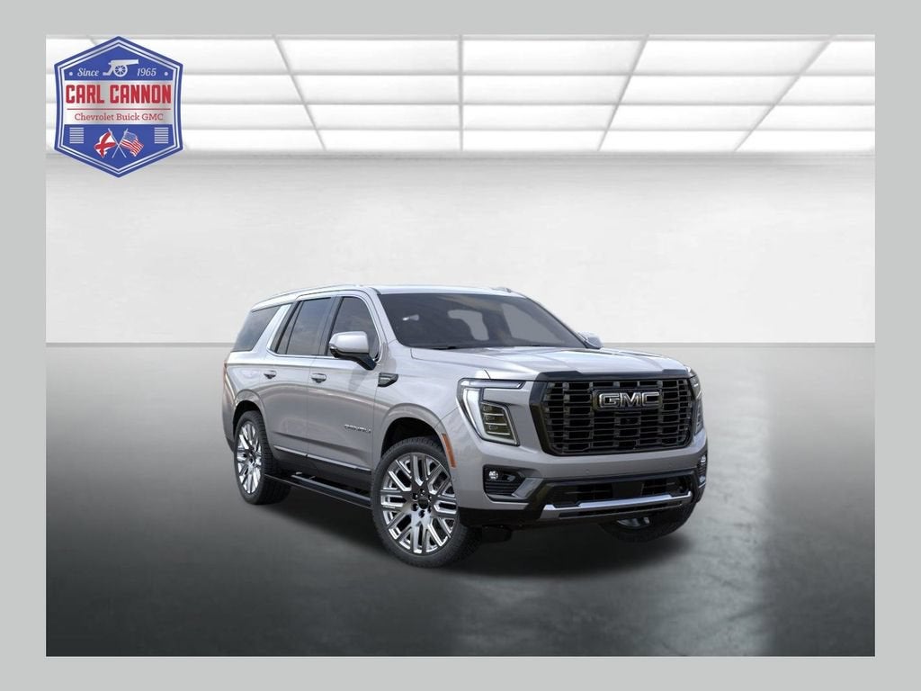 2026 GMC Yukon Denali Ultimate in Sterling Metallic — front three-quarter view