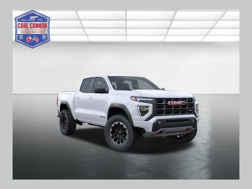 2026 GMC Canyon AT4 in Summit White — front three-quarter view